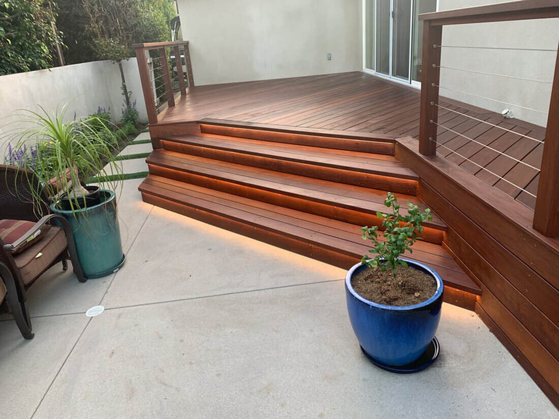 Custom hardwood deck and illuminated stairs